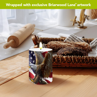 American Freedom Eagle Flameless Candle, patriotic design with eagle and American flag on cylindrical candle.