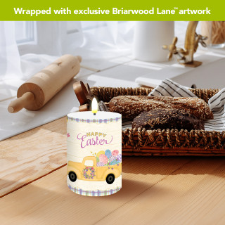 Happy Easter Pickup Flameless Candle, white and yellow with Easter eggs and purple plaid trim.