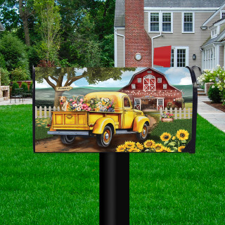 Flower Farm Mailbox Cover with yellow vintage truck and colorful flowers on a black mailbox post.