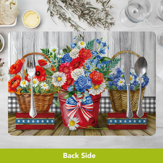 Red White and Beautiful Placemat with floral design on wooden table setting with utensils and baskets.