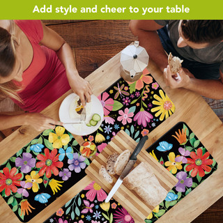 Spring Fling Placemat set of 4 colorful floral placemats on wooden table with couple.