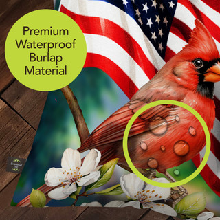 American Cardinal pillow on waterproof burlap material with flowers and American flag background, vibrant red bird.