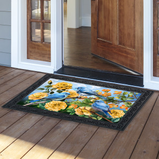Bluebirds and Roses Doormat with blue birds, yellow roses on black background, rectangular in shape.