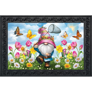 Vibrant gnome in pink hat standing amidst colorful flowers and butterflies on Springtime Gnome Doormat.