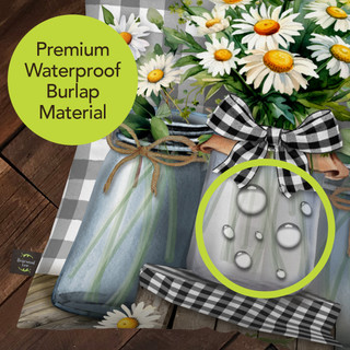 Farmhouse Jars Indoor/Outdoor Pillow, waterproof burlap material with daisies and black and white checkered accents.