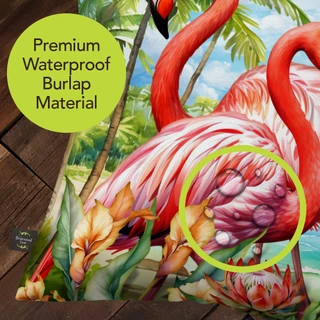 Flamingo Pair Indoor/Outdoor Pillow, pink flamingos on waterproof burlap material with tropical background.