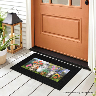 Black Garden Cats Mini Mat with colorful feline and floral design on front porch floor.