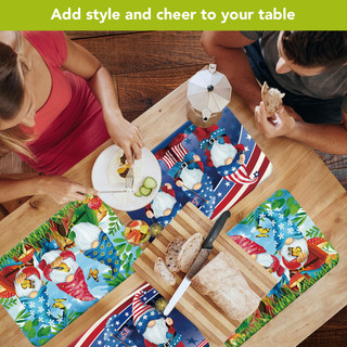 Four colorful gnome placemats on wooden table with food and people, Gnome Sweet Gnome design.