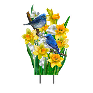Bluebirds on branches amidst yellow daffodils and white flowers on metal art garden decoration piece.