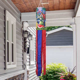 American Lemonade Windsock Wind Twister with floral design and red, blue ribbons hanging outdoors.
