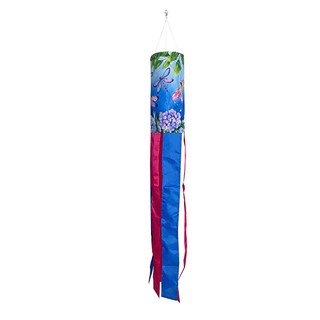 Dragonflies Windsock Wind Twister with blue and pink ribbons and floral design hanging from white string.