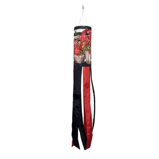Red and black windsock with geranium design hanging from white string on white background.
