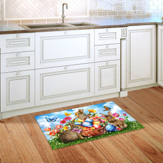 Springtime Bunnies colorful doormat with Easter eggs and bunnies on kitchen floor beside white cabinets.