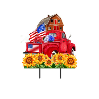 Red vintage truck with American flag, barn, and sunflowers, Land of the Free Metal Art sign.