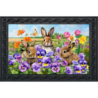 Spring Bunny Trio Doormat with colorful flowers and bunnies in a field with decorative frame.