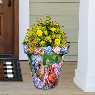 Perched Cardinals Large Planter with colorful flowers and birds design on front porch steps.