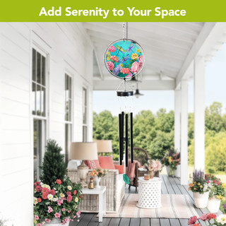 Dragonflies Illuminated Wind Chime hanging on porch with colorful dragonfly design and soft lighting outdoors.