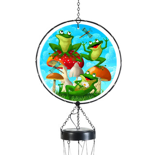 Happy Frogs Illuminated Wind Chime with colorful frogs and mushrooms on a blue background hanging freely.