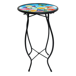 Black metal Fluttering Butterflies Plant Stand with colorful butterfly design on round table top surface.