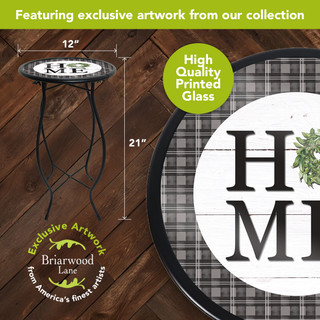 Home Plant Stand with round glass top and black metal frame on wooden floor beside measurements.