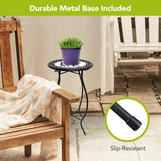 Home Plant Stand with durable metal base and slip-resistant feet on tiled patio with furniture.