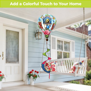 Floral Birdhouse Hot Air Balloon Spinner with colorful flowers and birdhouse design hanging from a porch.