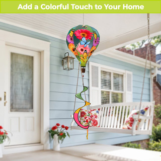 Garden Gerber Daisies Hot Air Balloon Spinner with colorful flowers and green spiral hanging outdoors.