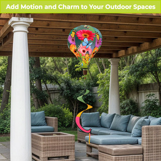 Garden Gerber Daisies Hot Air Balloon Spinner outdoor decor with colorful flowers and wicker patio furniture.