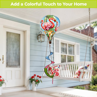 Flamingo Pair Hot Air Balloon Spinner with colorful flamingos and flowers hanging from a porch.