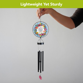 Bless This Home With Love Illuminated Wind Chime with colorful flowers and black tubes.