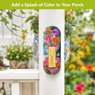 Zinnias in Bloom metal thermometer with colorful floral design and temperature gauge on white porch post.