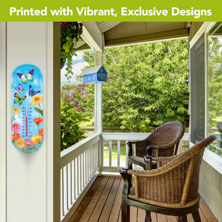 Fluttering Butterflies Metal Thermometer with colorful flowers and butterflies on a porch wall outdoors.