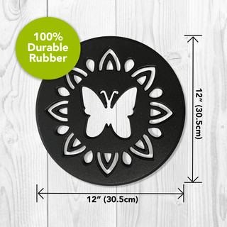 Black rubber stepping stone, 12 inches round, with white butterfly and decorative design pattern.