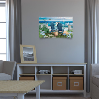 Large LED canvas art depicting a seaside escape scene with blue chairs and ocean view.