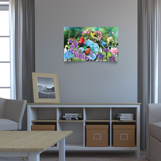 Large LED canvas art with colorful floral design featuring blue, pink, purple, and red flowers.