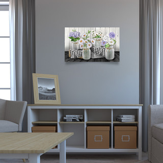 Large LED canvas art of checkered mason jars with flowers on a wooden table setting.