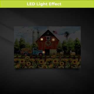 Large LED canvas art of a red barn with sunflowers, truck, and sheep at nighttime.