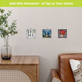 Home Metal Mini Moment decorative wall art set with HOME, beach, and floral designs on metal squares.