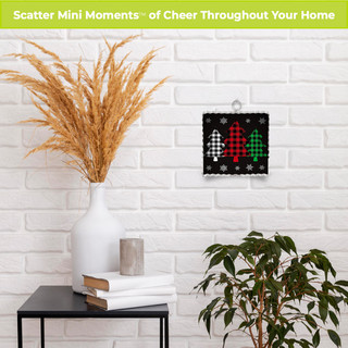Checkered Trees Metal Mini Moment decorative wall art with red, green, and white trees on black.