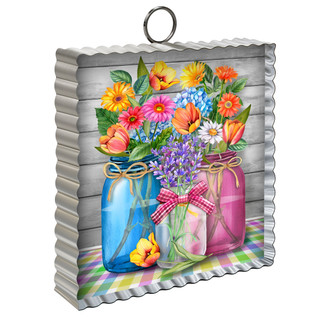 Metal mini moment with spring floral jars, blue, pink, and clear glass jars with colorful flowers.