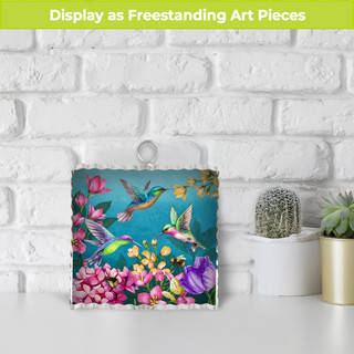Springtime Hummingbirds Metal Mini Moment, colorful hummingbirds and flowers on a blue background, metal art piece.