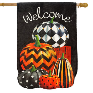 Black burlap house flag with welcome and stacked patterned pumpkins in orange, black, and white.