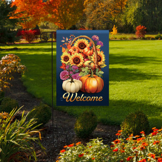 Fall Basket Garden Flag with sunflowers, pumpkins, and Welcome text on a blue background outdoors.
