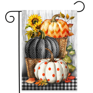 Pumpkin Basket Stack Garden Flag with orange, white, and black pumpkins on a plaid background.