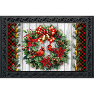 Cardinal Wreath Doormat with red cardinals, evergreen, and plaid bow on white wood background.