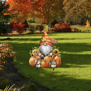 Gnome and Pumpkins Metal Art decoration featuring a gnome with pumpkins and sunflowers in a yard.