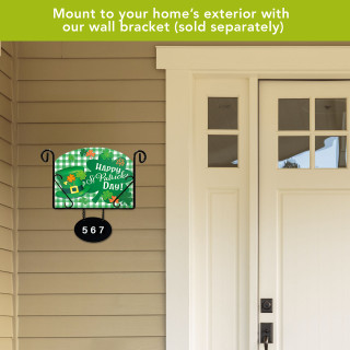 Green and white St. Patrick's Day acrylic art sign with shamrocks and Happy St. Patrick's Day text.