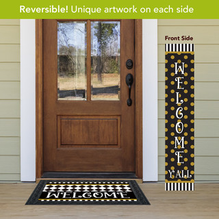 Checkerboard pine reversible porch leaner, black and yellow polka dots with welcome text on front side.