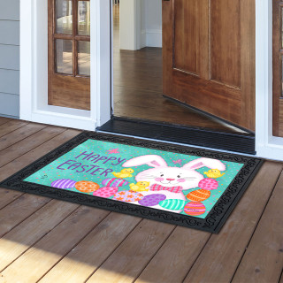 Easter Time Doormat with colorful bunny and eggs on green background with black border.