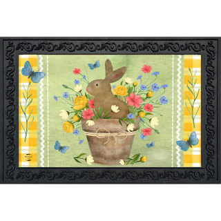 Brown bunny in a flowerpot with colorful flowers and butterflies on a green background doormat.